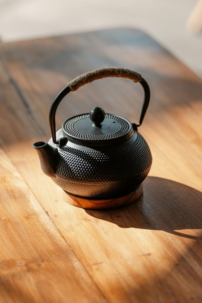 A cast iron teapot.